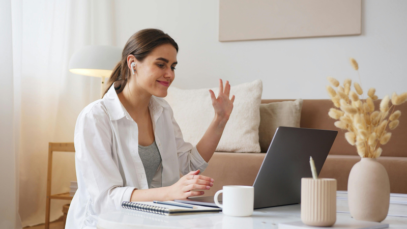 woman video-conferencing on laptop